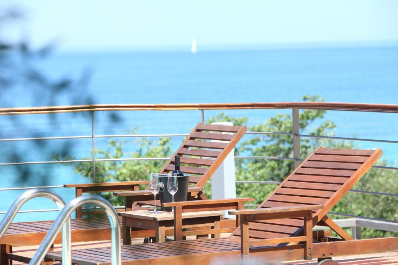 Capro - Milos Bay Villas Áyios Nikítas Buitenkant foto
