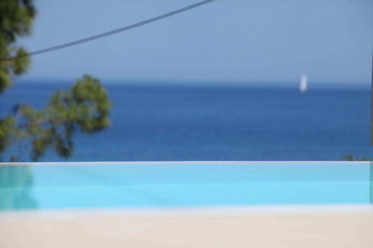 Capro - Milos Bay Villas Áyios Nikítas Buitenkant foto